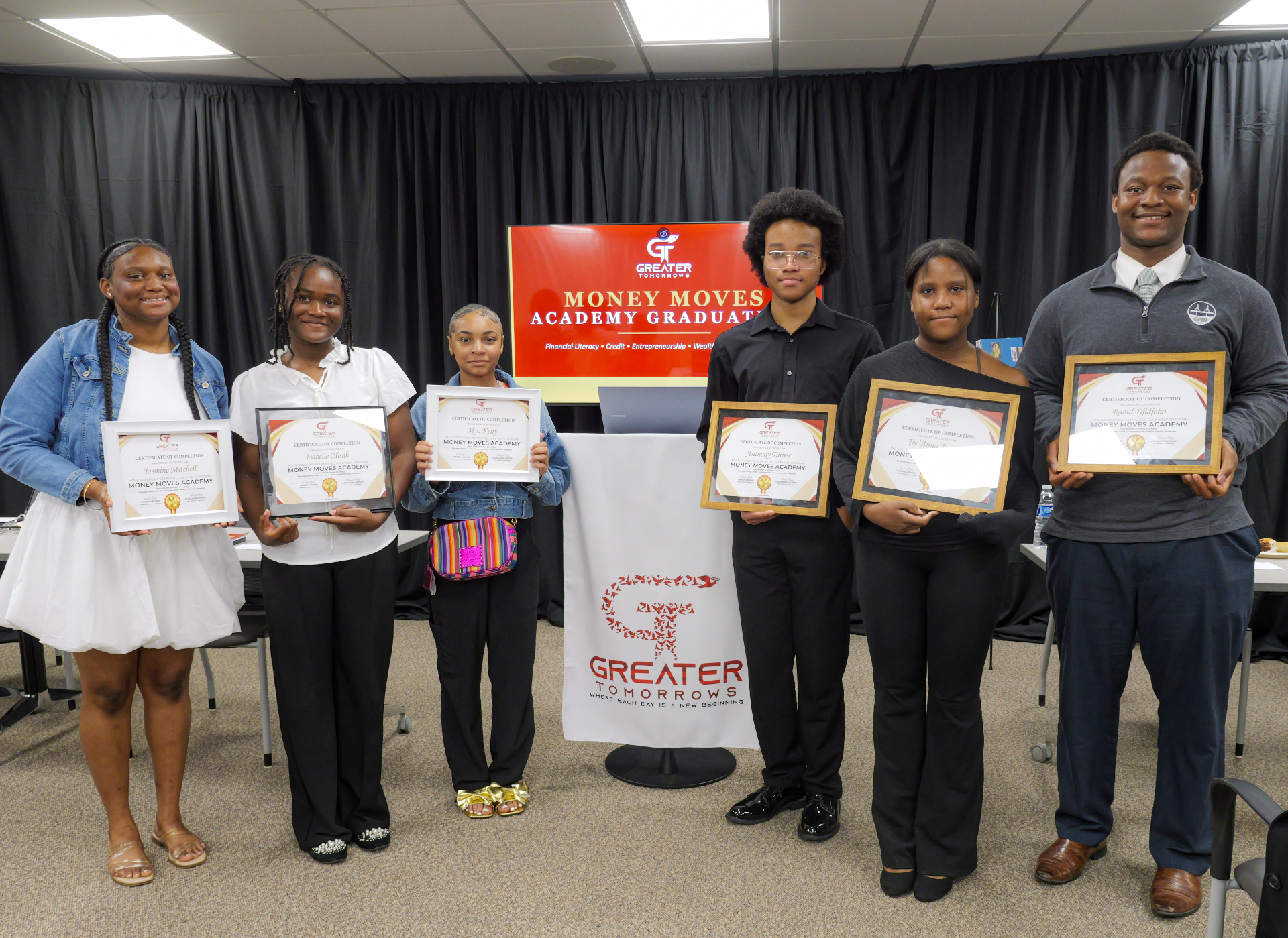 Money Moves Academy graduate presenting their Personal Wealth Plan